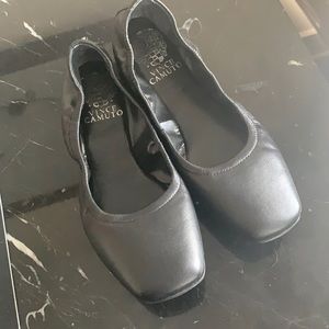 Black leather flats